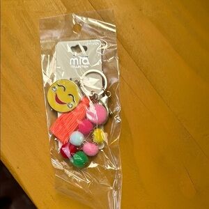 Mia Collection Rainbow Pom Pom Smiley Face Gold Tassel Keychain